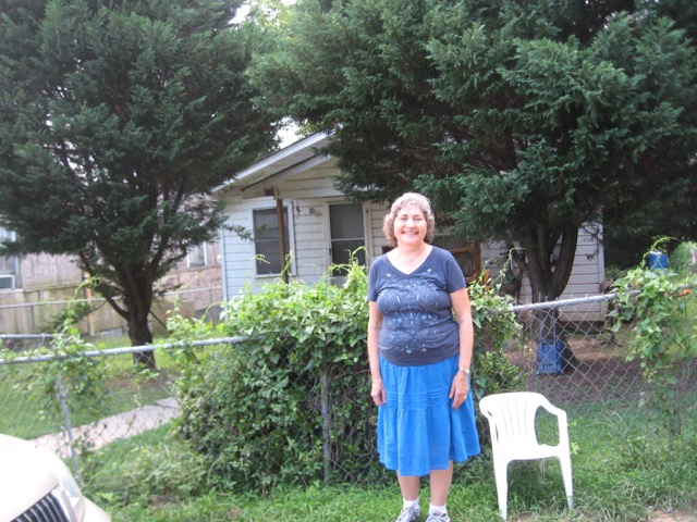 Janet standing where Lilly Ann's house would have stood in Natchez. The house in the photo is not Lilly Ann's house.