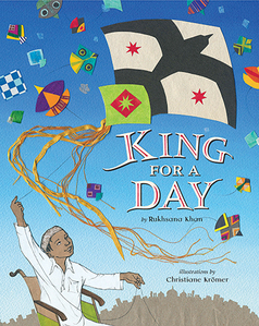 Cover of King for a Day with an illustration of a child in a wheelchair flying a larger kite and colorful kites all around in the sky