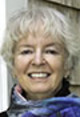 Jean Ciborowski Fahey author photo: A white woman with short white hair wearing a blue scarf