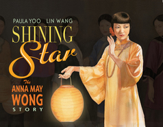 Cover of Shining Star: The Anna May Wong Story showing Anna May holding a rice paper lantern