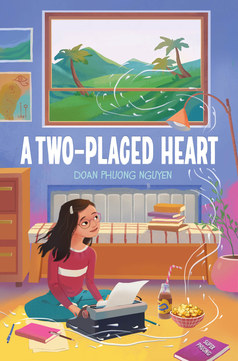 Cover of A Two-Placed Heart showing a young girl typing on a typewriter in a room with books, popcorn, and a drink, and the landscape of Vietnam out the window