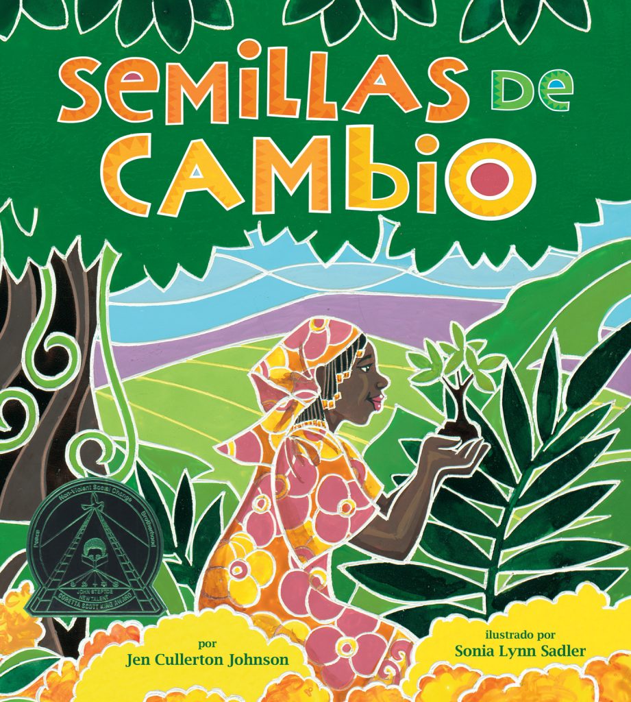 Cover of Semillas de cambio: Sembrando un camino hacia
la paz, showing a woman in a floral dress and matching head scarf, bent down in a field of flowers, holding up a green, leafy plant. Green trees, leaves, and a large farming field are behind her.